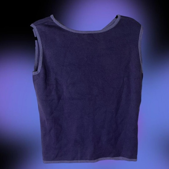 Purple sweater vest with lavender trim. Vneck  Measurements: Bust 35 in. - Picture 5 of 5